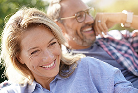 a couple enjoying the benefits of dental implants in Corbin