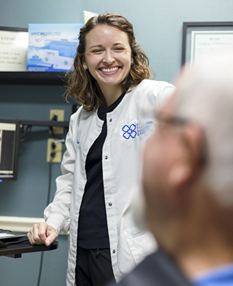 Doctor Whitaker smiling at a patient