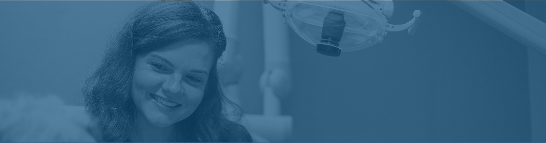 Corbin dentist smiling at a patient