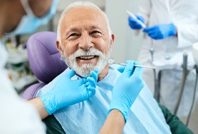 Man smiling in the dental chair