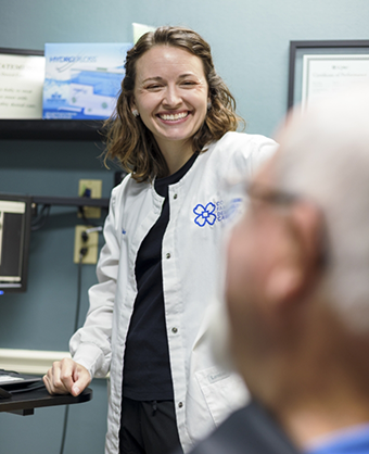Doctor Whitaker grinning at a patient