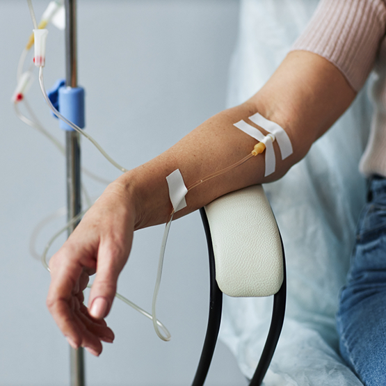 Patient's arm hooked up to an IV