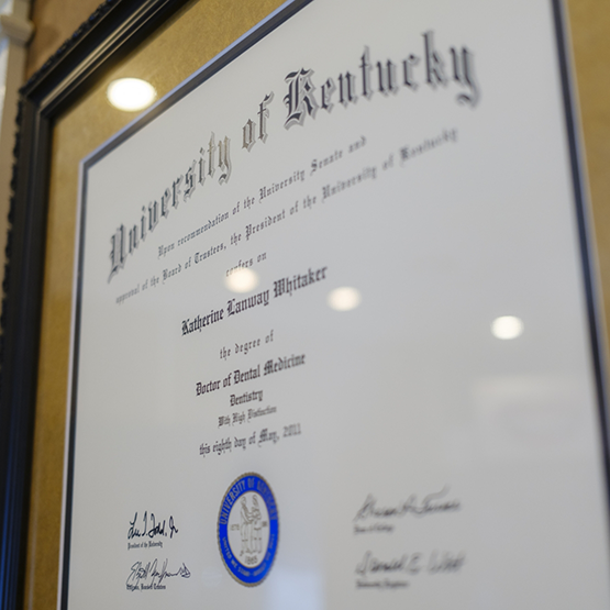 Doctor Whitaker's framed Doctor of Dental Surgery degree from the University of Kentucky