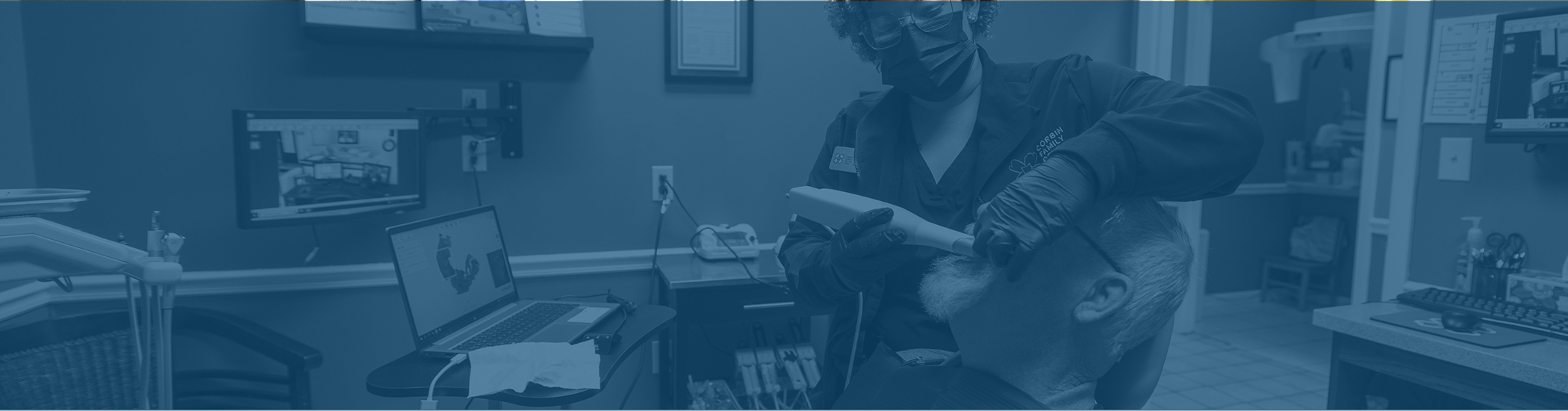 Dentist taking digital scans of a patient's teeth