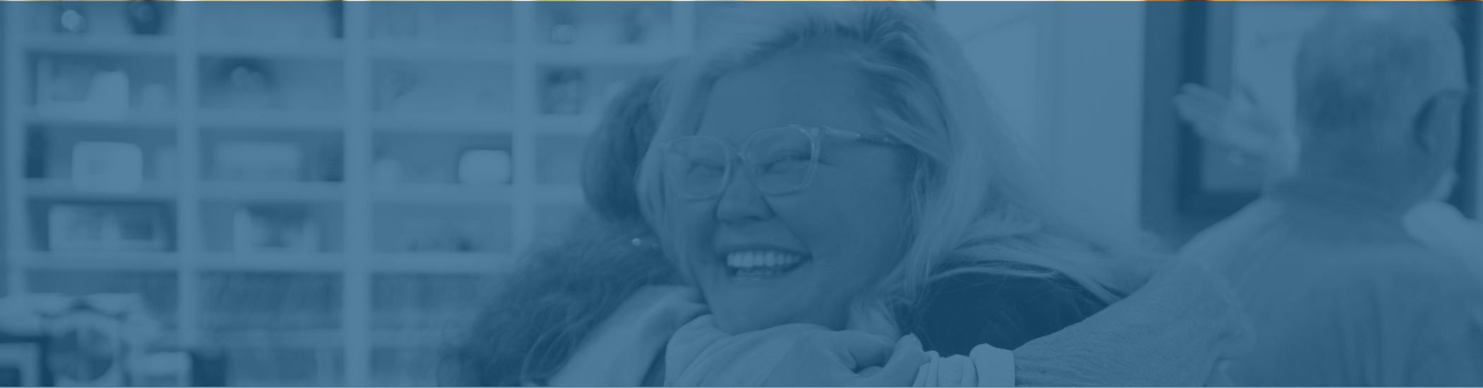 Two women embracing in a dental office in Corbin