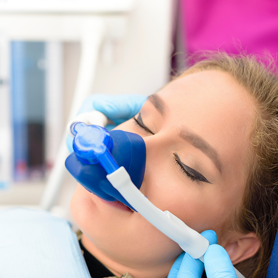 Young woman getting nitrous oxide sedation