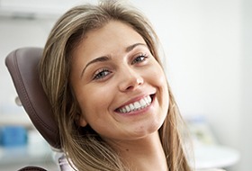 Smiling woman in dental chair