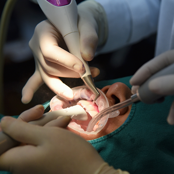 Dental patient receiving gum disease treatment