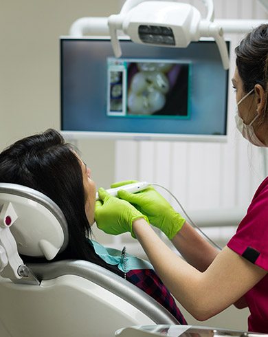 Patient receiving intraoral photos