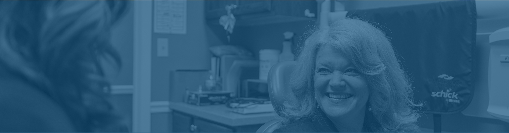 Woman grinning at her dentist after teeth whitening in Corbin