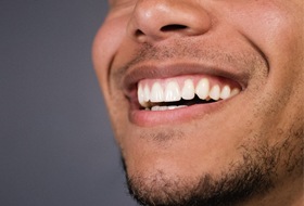 man smiling teeth