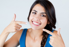 woman pointing smiling
