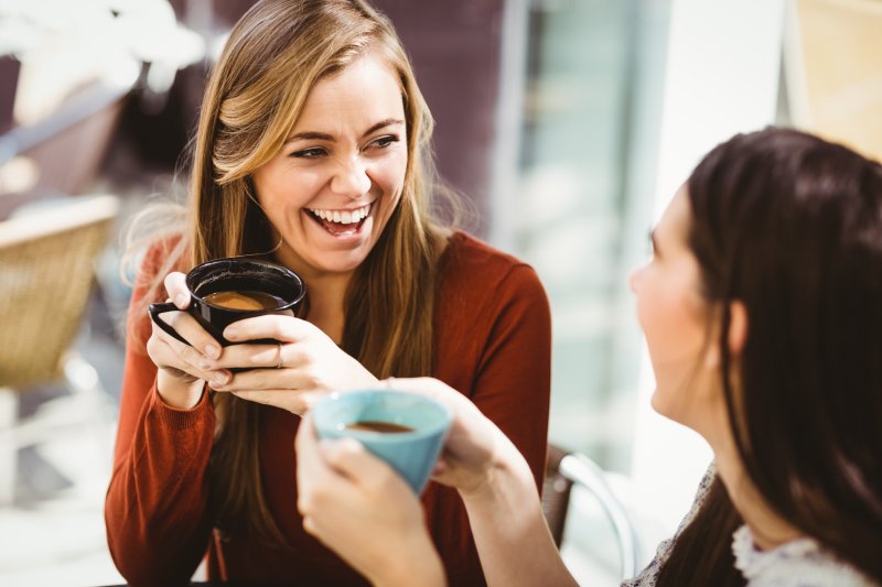 friends celebrating national coffee day