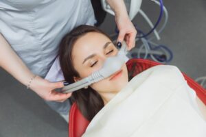 Woman undergoing sedation dentistry.